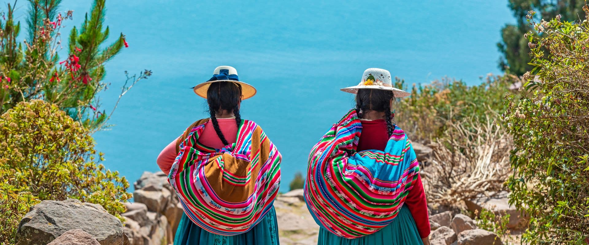 women in traditional clothes header